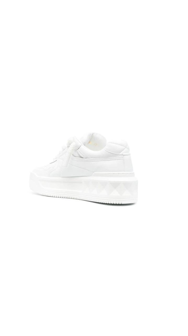 Valentino Garavani One Stud XL low-top sneaker in white nappa leather.