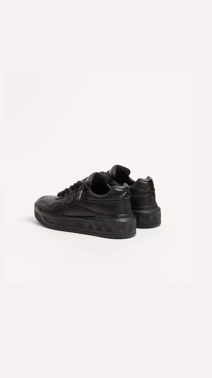Valentino Garavani One Stud XL low-top sneaker in black nappa leather.