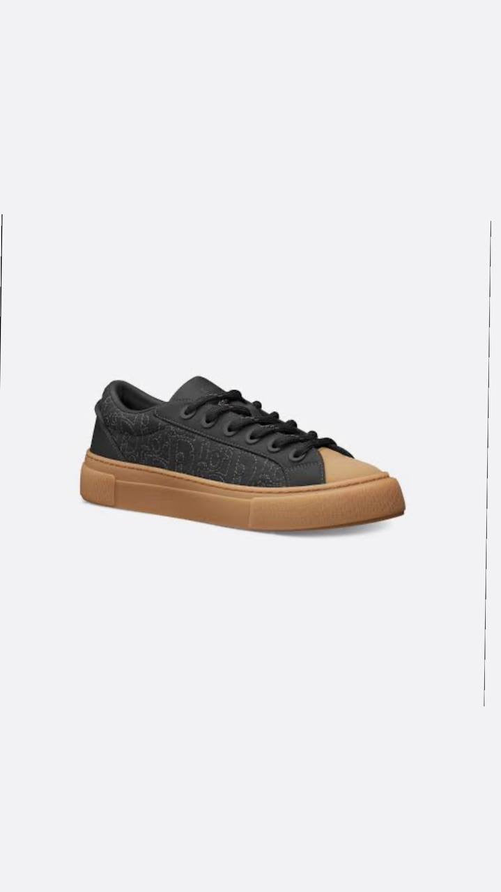 Dior B33 sneaker in black fabric with a gum sole.
