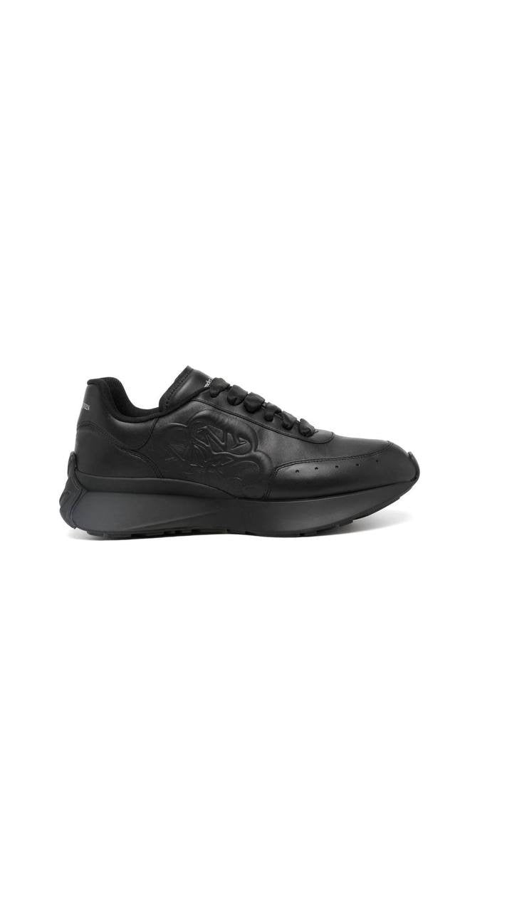 Alexander McQueen Sprint Runner sneaker in black leather.