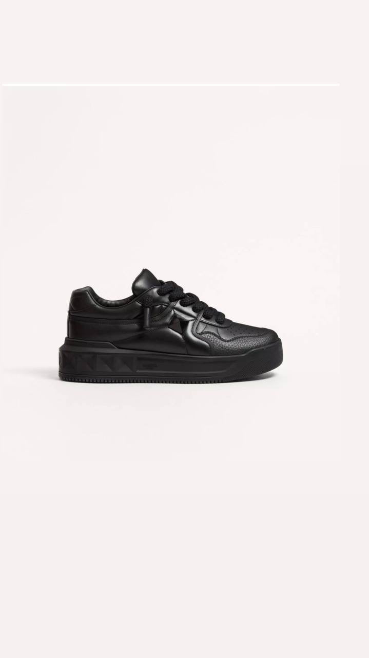 Valentino Garavani One Stud XL low-top sneaker in black nappa leather.