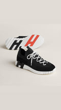 black Hermès Lift slip-on sneakers