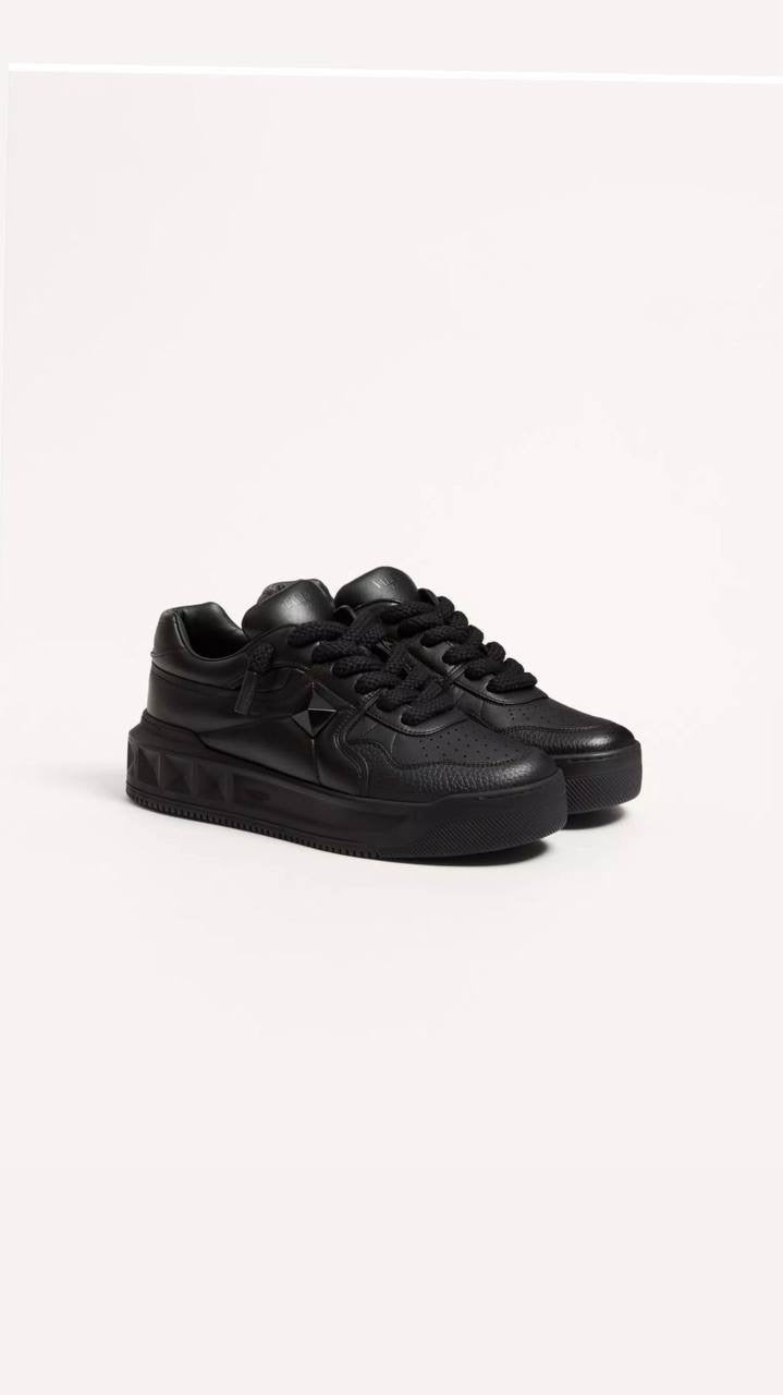 Valentino Garavani One Stud XL low-top sneaker in black nappa leather.