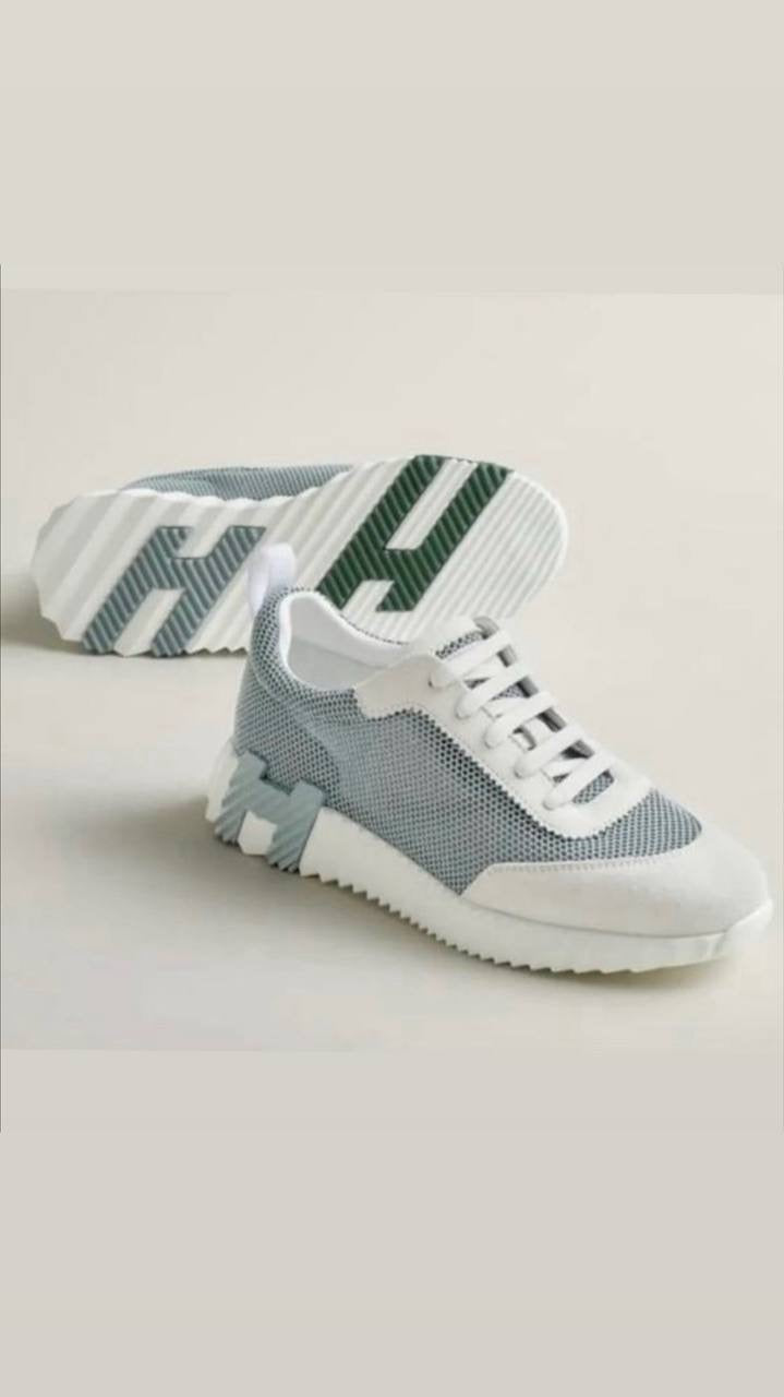 The Hermès Bouncing Sneaker in air mesh and suede goatskin
