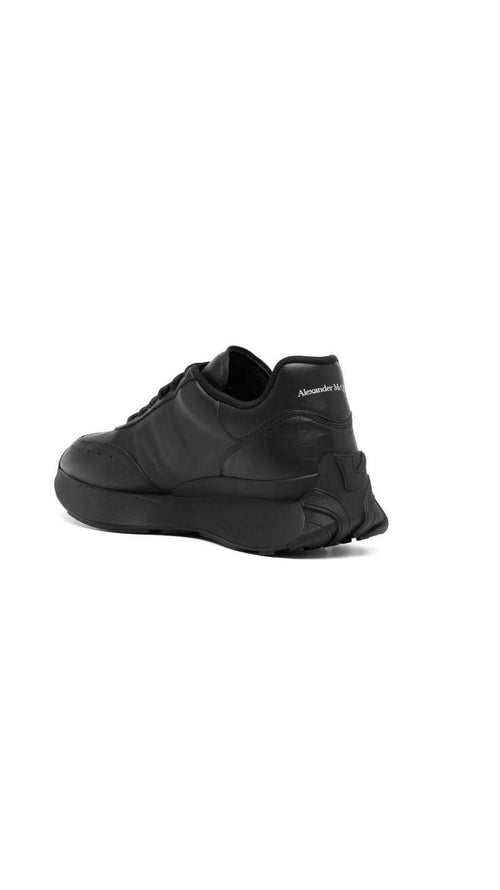 Alexander McQueen Sprint Runner sneaker in black leather.